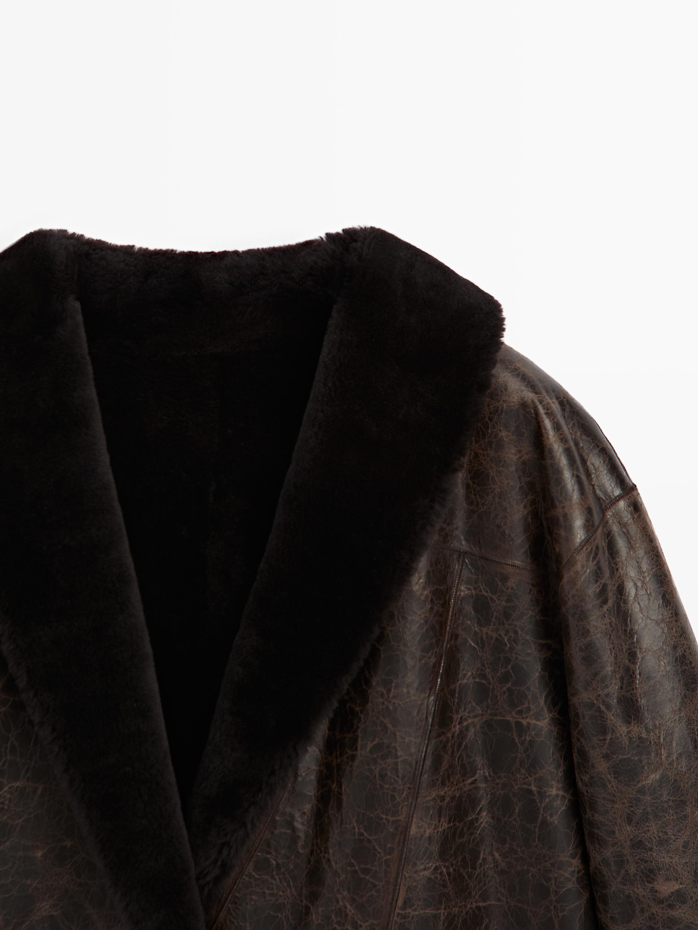 Mouton leather coat with crackled finish